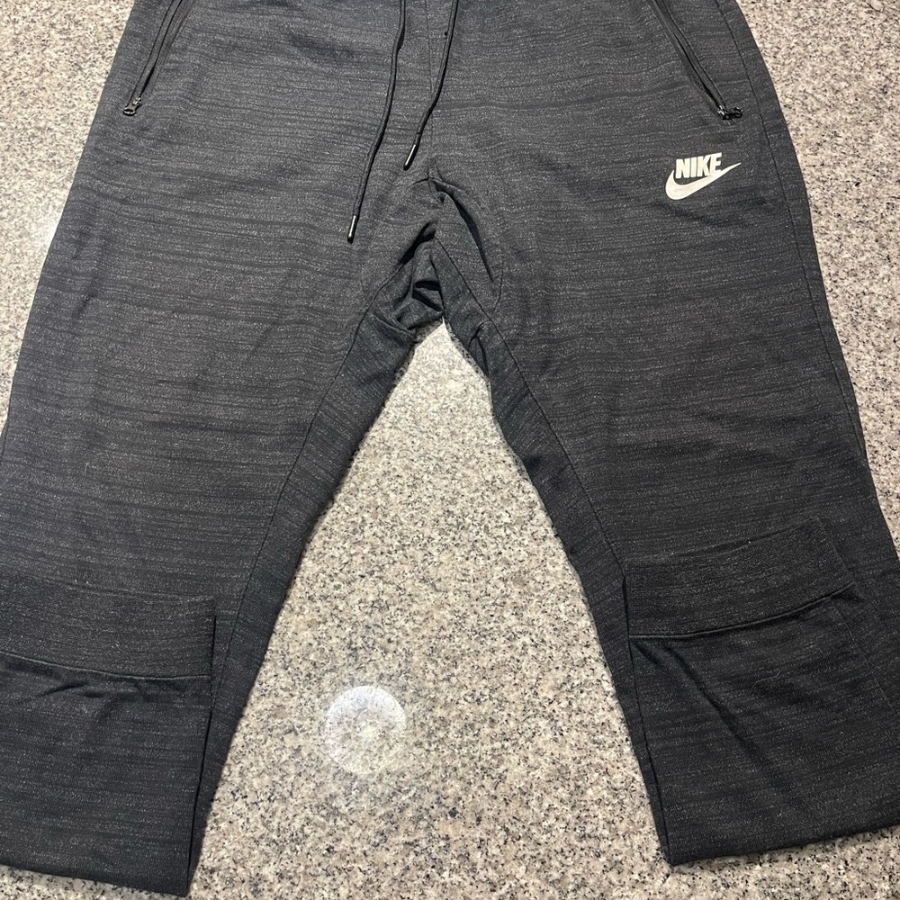 Nike Black Sweatpants with Iconic Swoosh Logo